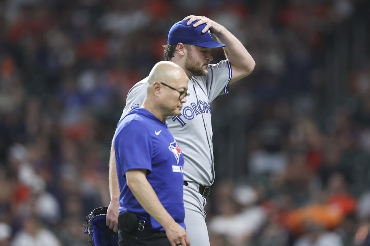 Aug 4, 2026; Houston, Texas, USA; Toronto Blue Jays starting pitcher Trey Yesavage (39) walks off the field after an apparent injury during the third inning against the Houston Astros at Daikin Park. Mandatory Credit: Troy Taormina-Imagn Images