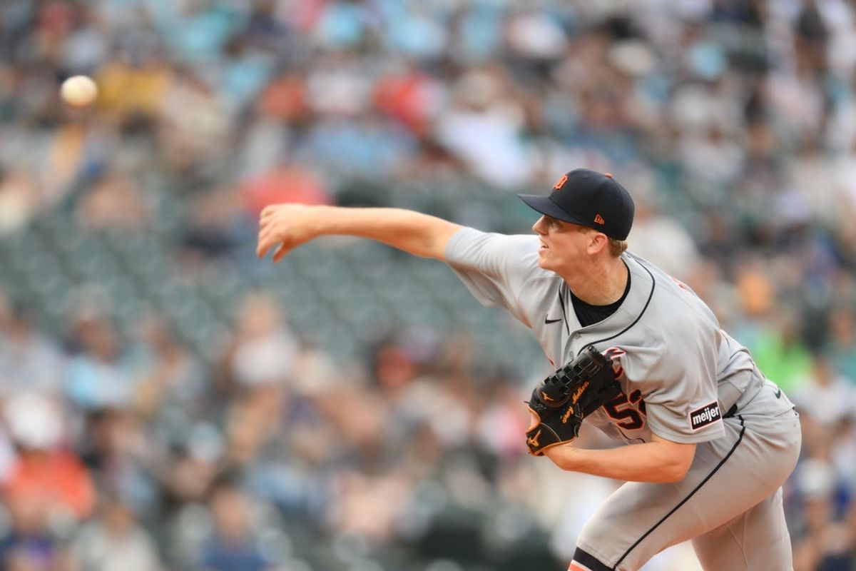 Aug 4, 2026; Seattle, Washington, USA; Detroit Tigers starting pitcher Troy Melton (52) pitches to the Seattle Mariners during the first inning at T-Mobile Park. Mandatory Credit: Steven Bisig-Imagn Images