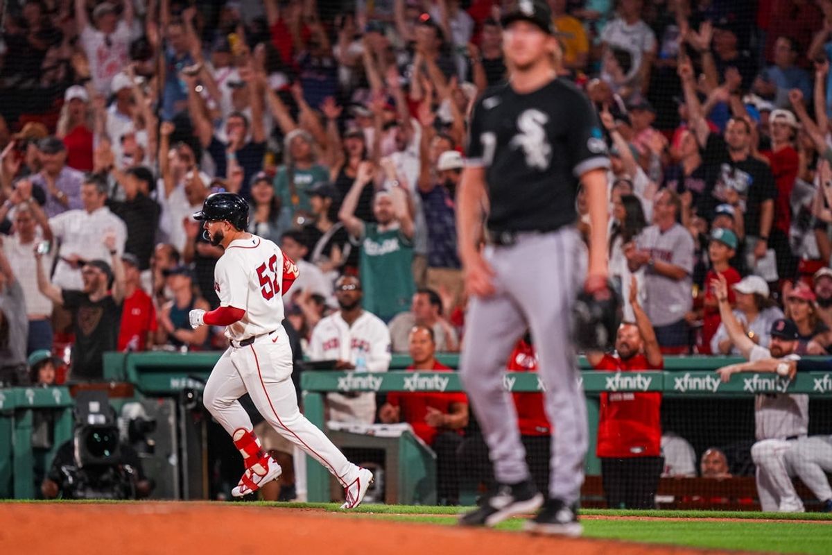 Aug 4, 2026; Boston, Massachusetts, USA; Boston Red Sox right fielder Wilyer Abreu (52) hits a home run against Chicago White Sox pitcher Erick Fedde (47) in the eighth inning at Fenway Park. Mandatory Credit: David Butler II-Imagn Images
