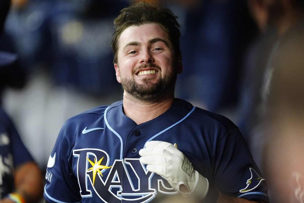 Aug 4, 2026; Denver, Colorado, USA; Tampa Bay Rays catcher Liam Hicks (34) celebrates his grand slam home run in the third inning against the Colorado Rockies at Coors Field. Mandatory Credit: Ron Chenoy-Imagn Images