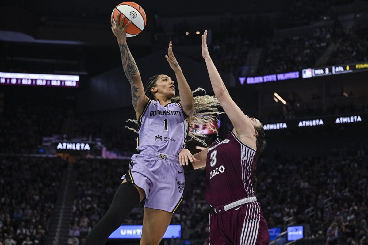 Aug 4, 2026; San Francisco, California, USA; Golden State Valkyries forward Gabby Williams (1) shoots over Toronto Tempo guard Marina Mabrey (3) during the second quarter at Chase Center. Mandatory Credit: Justine Willard-Imagn Images