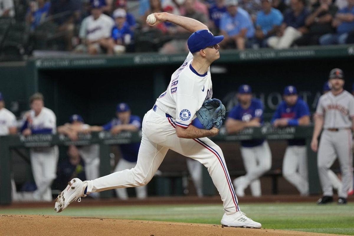 Aug 5, 2026; Arlington, Texas, USA; Texas Rangers starting pitcher Cody Bradford delivers a pitch to the San Francisco Giants during the first inning at Globe Life Field. Mandatory Credit: Jim Cowsert-Imagn Images