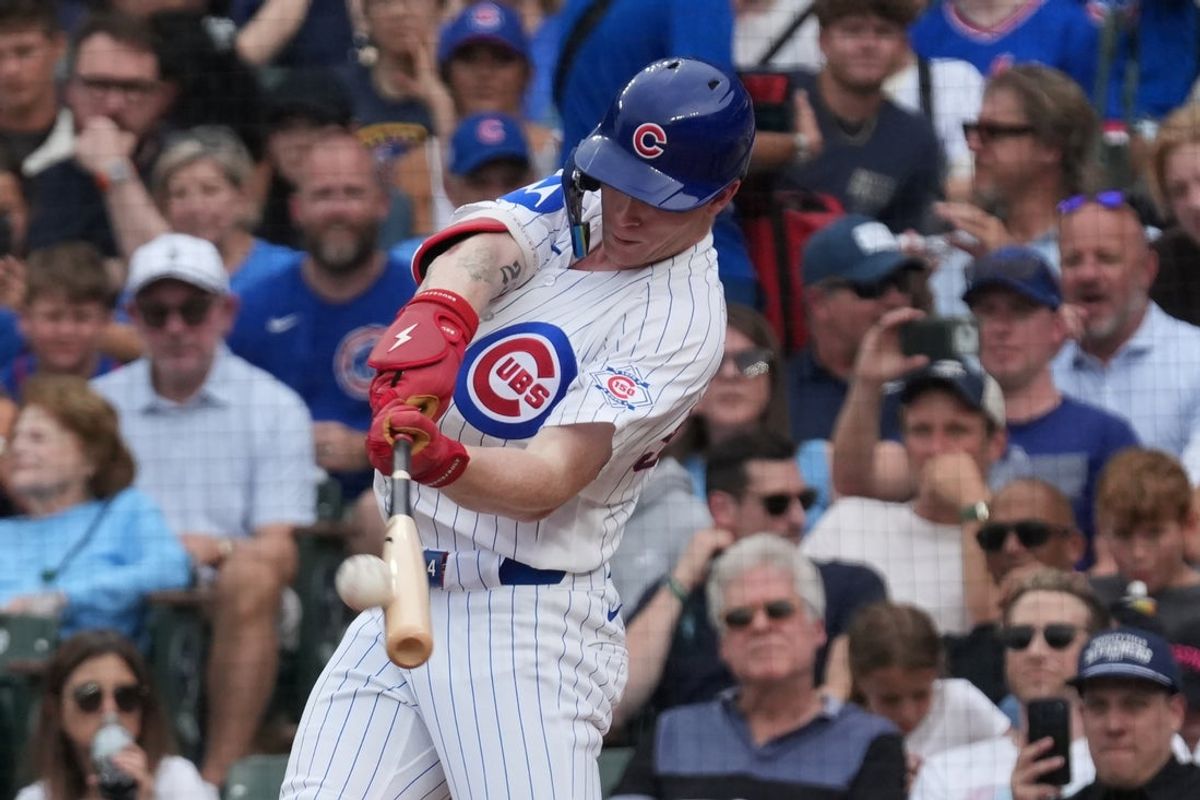 Aug 5, 2026; Chicago, Illinois, USA; Chicago Cubs center fielder Pete Crow-Armstrong (4) hits a two-run home run against the Los Angeles Dodgers during the fourth inning at Wrigley Field. Mandatory Credit: David Banks-Imagn Images