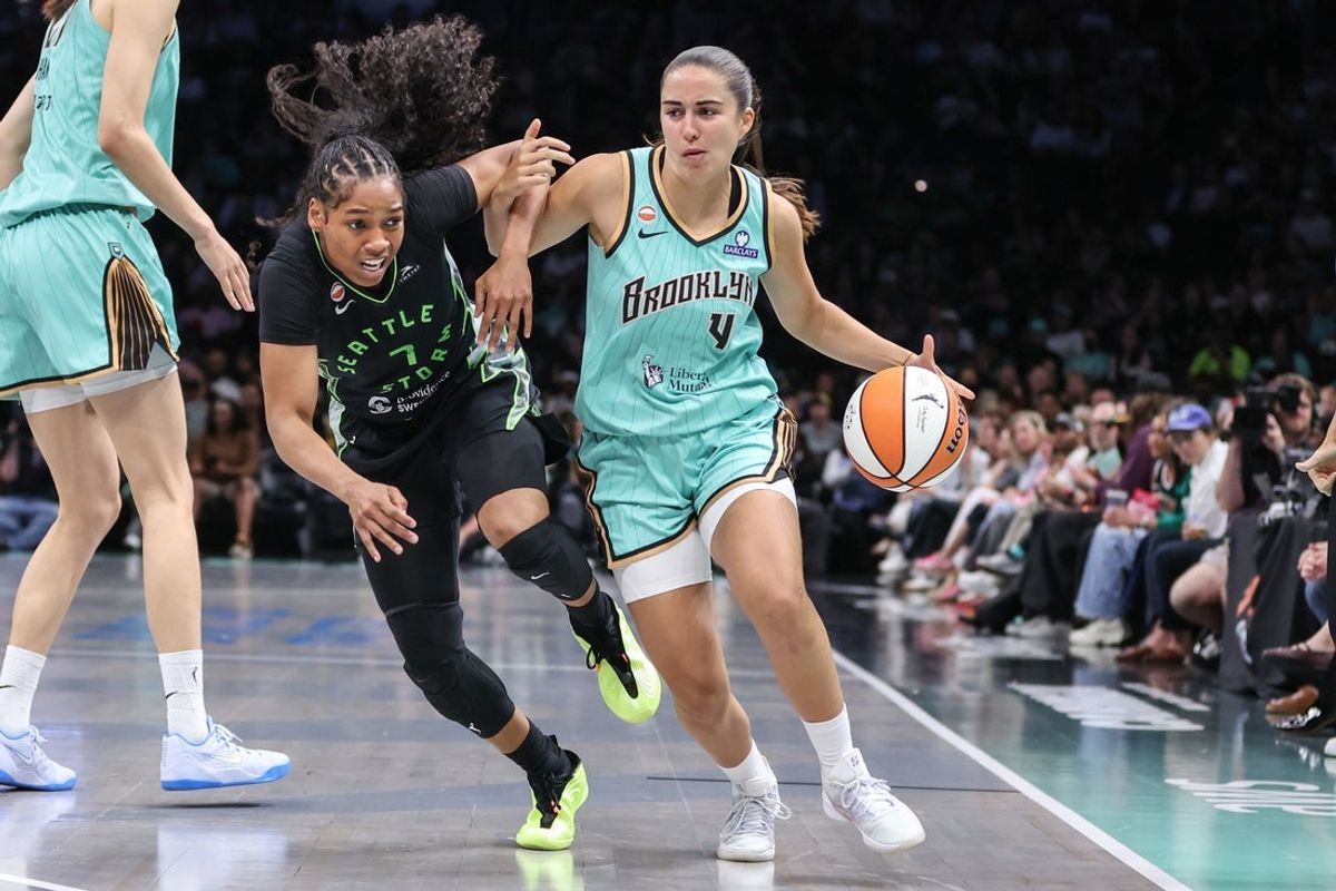 Aug 5, 2026; Brooklyn, New York, USA;  New York Liberty Marine Fauthoux (4) looks to drive past Seattle Storm guard Zia Cooke (7) in the first quarter at Barclays Center. Mandatory Credit: Wendell Cruz-Imagn Images