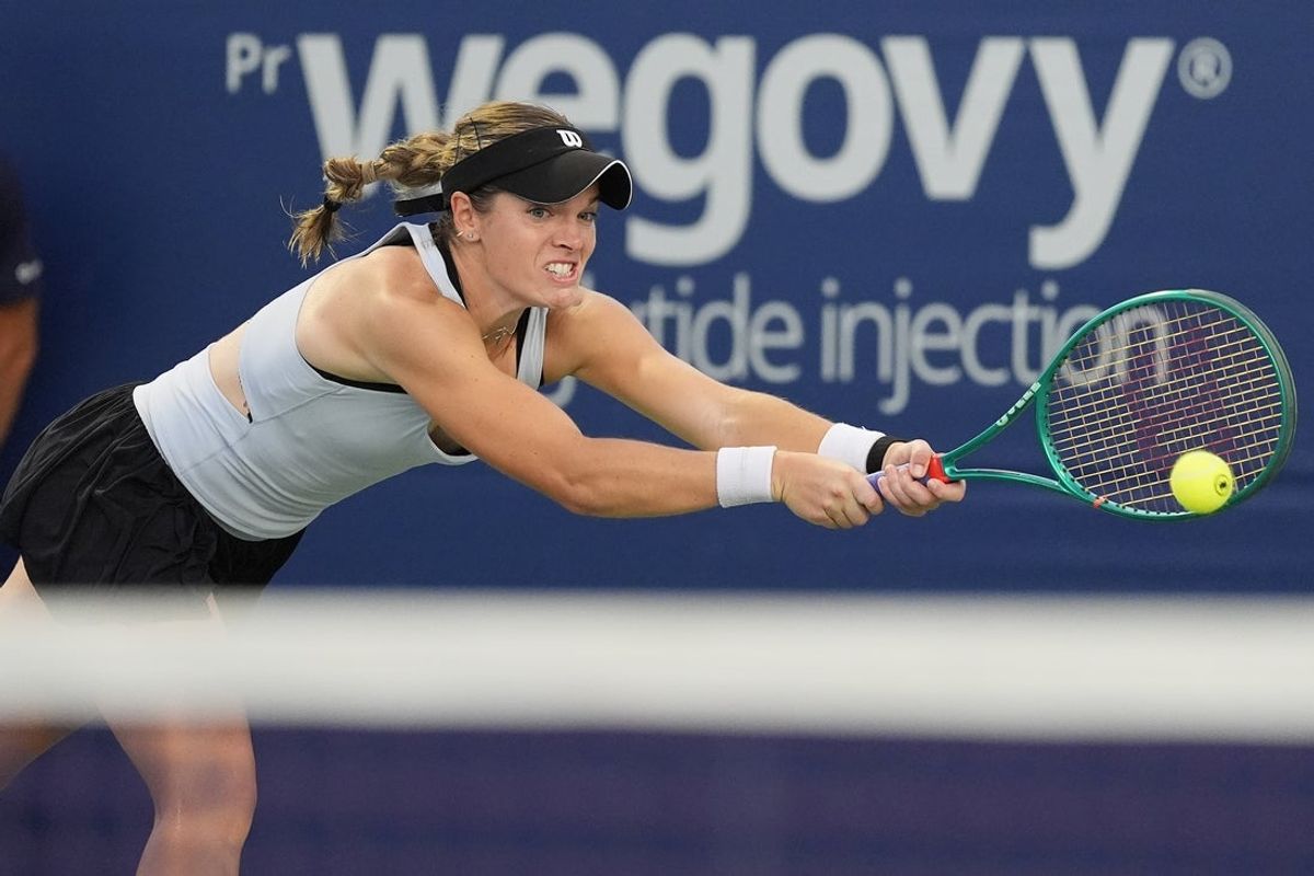 Aug 5, 2026; Toronto, Ontario, Canada; Caty McNally (USA) hits a ball to Linda Noskova (not pictured) during round two play of the National Bank Open at Sobeys Stadium. Mandatory Credit: John E. Sokolowski-Imagn Images