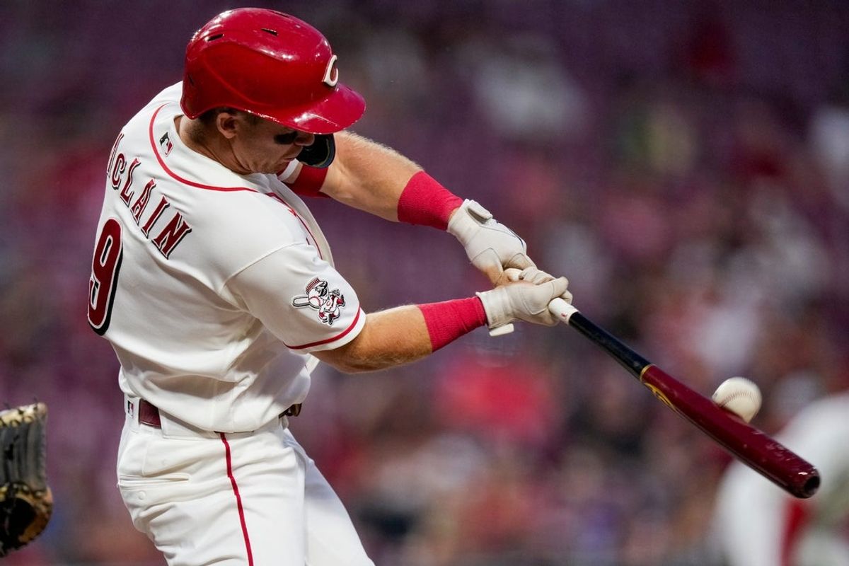 Cincinnati Reds second baseman Matt McLain (9) flies out in the seventh inning of the MLB Interleague game between the Cincinnati Reds and the Athletics at Great American Ball Park in downtown Cincinnati on Wednesday, Aug. 5, 2026 The Reds won the second game of the series, 3-2.