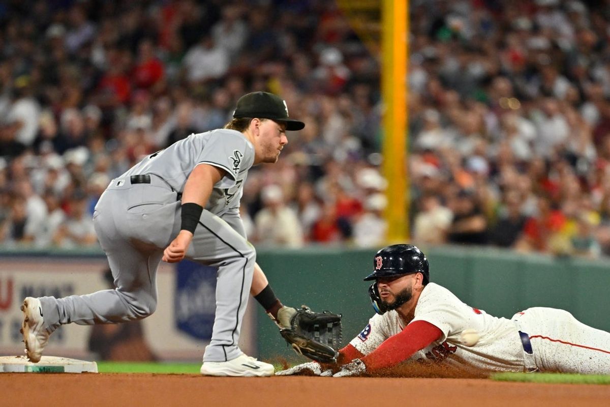 Aug 5, 2026; Boston, Massachusetts, USA; Boston Red Sox right fielder Wilyer Abreu (52) steals second base against Chicago White Sox second baseman Chase Meidroth (10) during the eighth inning at Fenway Park. Mandatory Credit: Eric Canha-Imagn Images