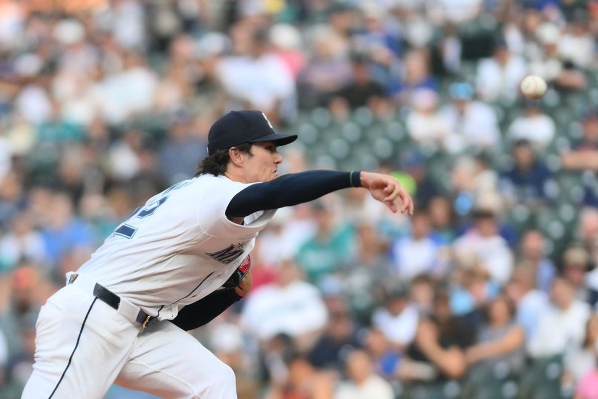 Aug 5, 2026; Seattle, Washington, USA; Seattle Mariners starting pitcher Bryan Woo (22) pitches to the Detroit Tigers during the first inning at T-Mobile Park. Mandatory Credit: Steven Bisig-Imagn Images