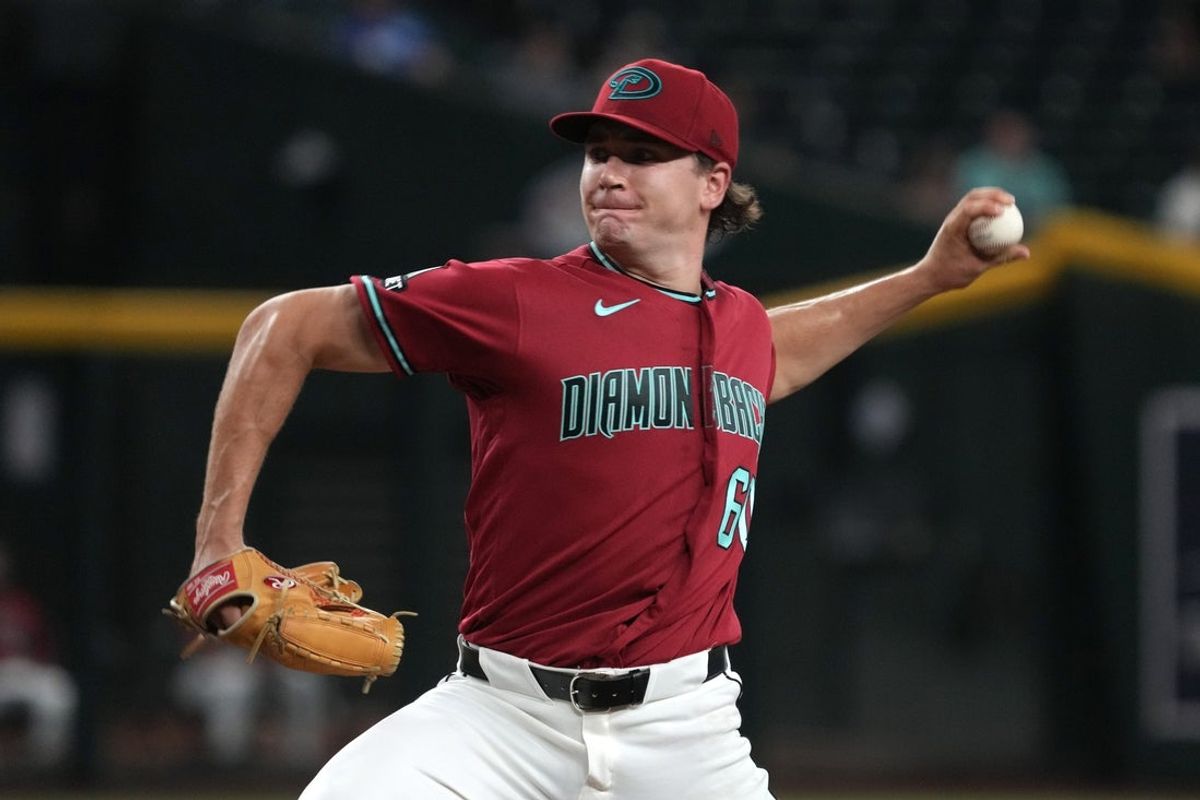 Aug 5, 2026; Phoenix, Arizona, USA; Arizona Diamondbacks pitcher Mitch Bratt (60) throws against the San Diego Padres in the first inning at Chase Field. Mandatory Credit: Rick Scuteri-Imagn Images