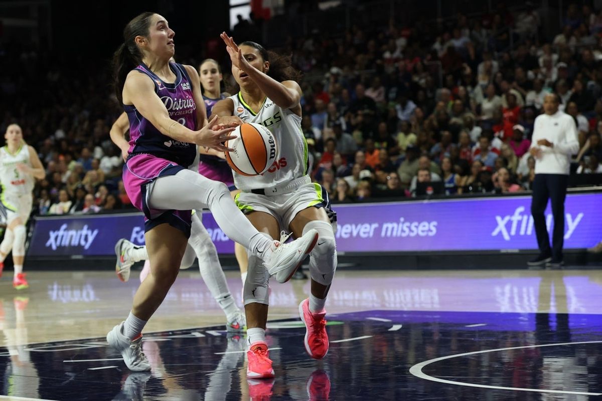 Aug 5, 2026; Washington, District of Columbia, USA; Dallas Wings guard Azzi Fudd (35) knocks the ball from Washington Mystics guard Georgia Amoore (8) in the second half at CareFirst Arena. Mandatory Credit: Geoff Burke-Imagn Images