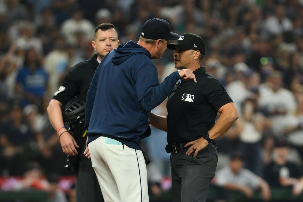Aug 5, 2026; Seattle, Washington, USA; Seattle Mariners manager Dan Wilson reacts to being ejected by umpire Mark Wegner (14) during the eighth inning against the Detroit Tigers at T-Mobile Park. Mandatory Credit: Steven Bisig-Imagn Images