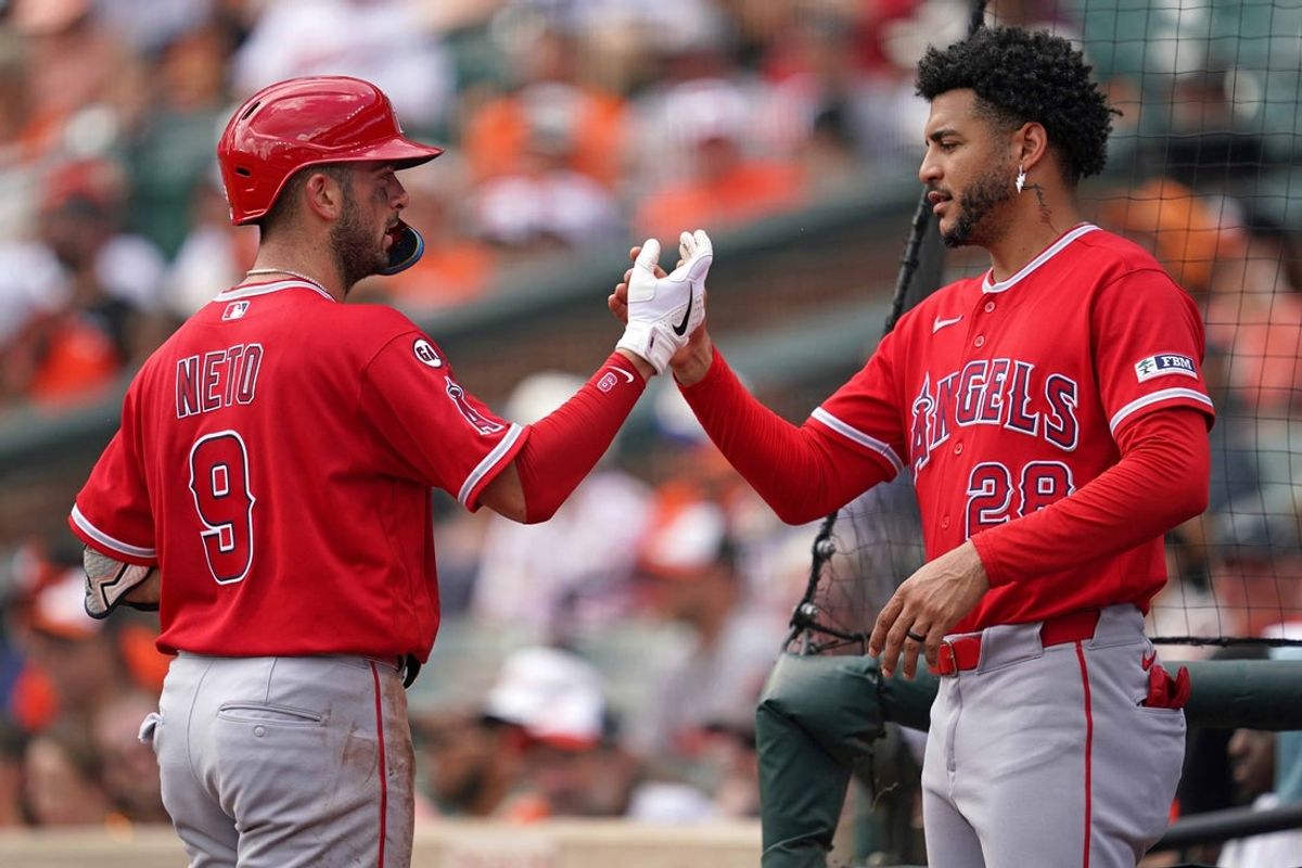 Aug 6, 2026; Baltimore, Maryland, USA; Los Angeles Angels shortstop Zach Neto (9) greeted by outfielder Jose Siri (28) after connecting on a three-run home run during the third inning against the Baltimore Orioles at Oriole Park at Camden Yards. Mandatory Credit: Mitch Stringer-Imagn Images
