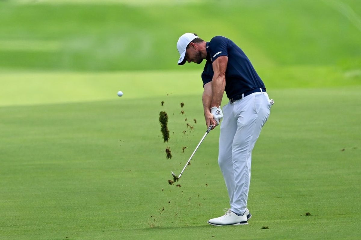 Aug 6, 2026; Bedminster, New Jersey, USA; Laurie Canter hits out of the fairway on the 18th hole during the first round of the LIV Golf New York tournament at Trump National Bedminster. Mandatory Credit: Dennis Schneidler-Imagn Images