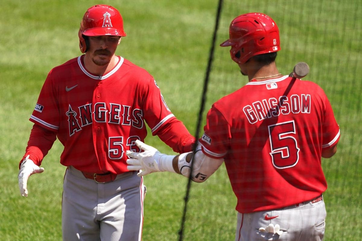 Aug 6, 2026; Baltimore, Maryland, USA; Los Angeles Angels outfielder Wade Meckler (53) greeted by third baseman Vaughn Grissom (5) after scoring during the seventh inning against the Baltimore Orioles at Oriole Park at Camden Yards. Mandatory Credit: Mitch Stringer-Imagn Images