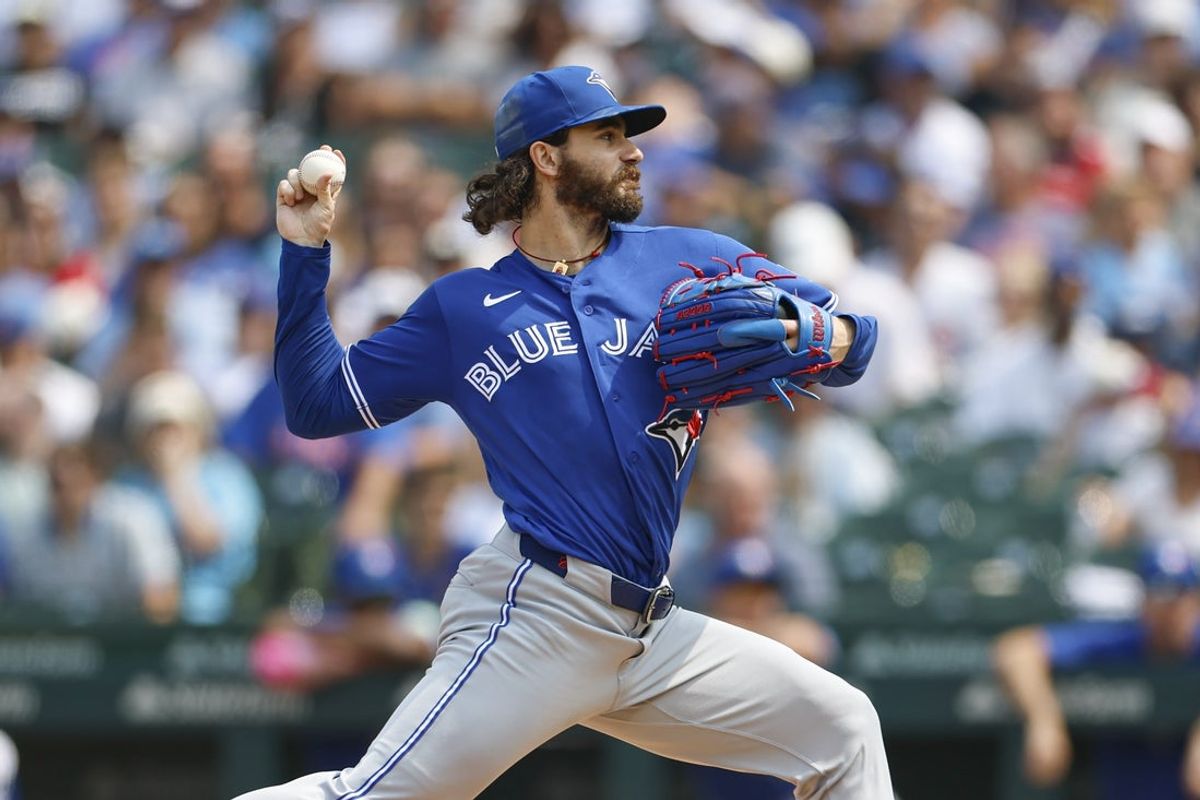 Aug 6, 2026; Chicago, Illinois, USA; Toronto Blue Jays starting pitcher Dylan Cease (84) delivers a pitch against the Chicago Cubs during the fourth inning at Wrigley Field. Mandatory Credit: Kamil Krzaczynski-Imagn Images