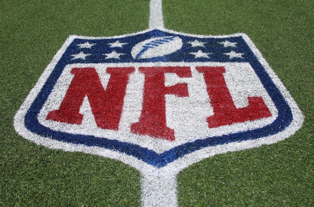 Aug 6, 2026; Canton, Ohio, USA;  The NFL shield logo on the field before the Carolina Panthers and Arizona Cardinals play at Tom Benson Hall of Fame Stadium. Mandatory Credit: Charles LeClaire-Imagn Images
