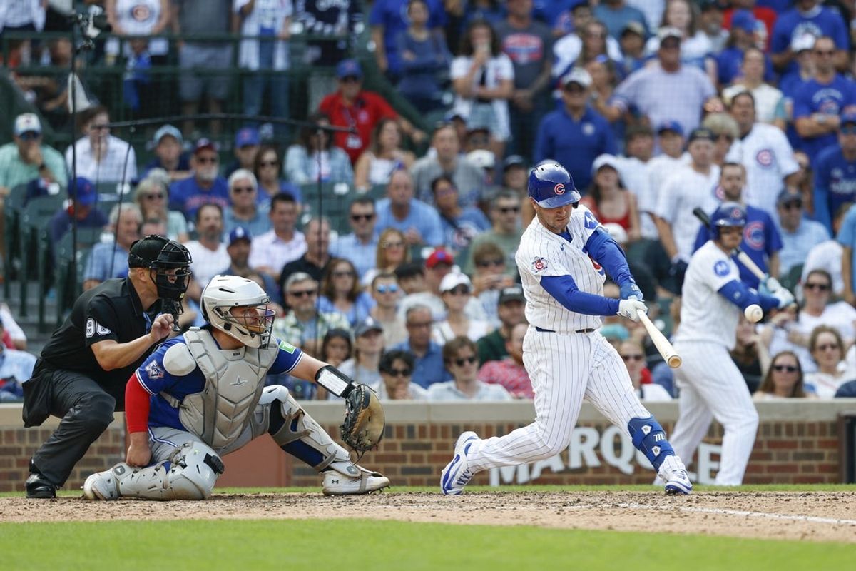 Aug 6, 2026; Chicago, Illinois, USA; Chicago Cubs third baseman Alex Bregman (3) hits a two-run home run against the Toronto Blue Jays during the ninth inning at Wrigley Field. Mandatory Credit: Kamil Krzaczynski-Imagn Images