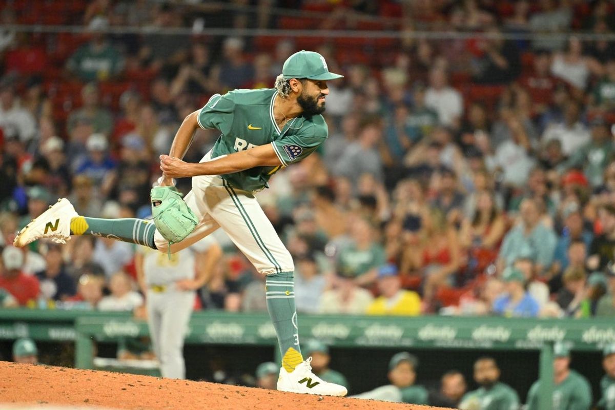 Aug 7, 2026; Boston, Massachusetts, USA; Boston Red Sox pitcher Raymond Burgos (79) pitches against the Athletics during the ninth inning at Fenway Park. Mandatory Credit: Eric Canha-Imagn Images