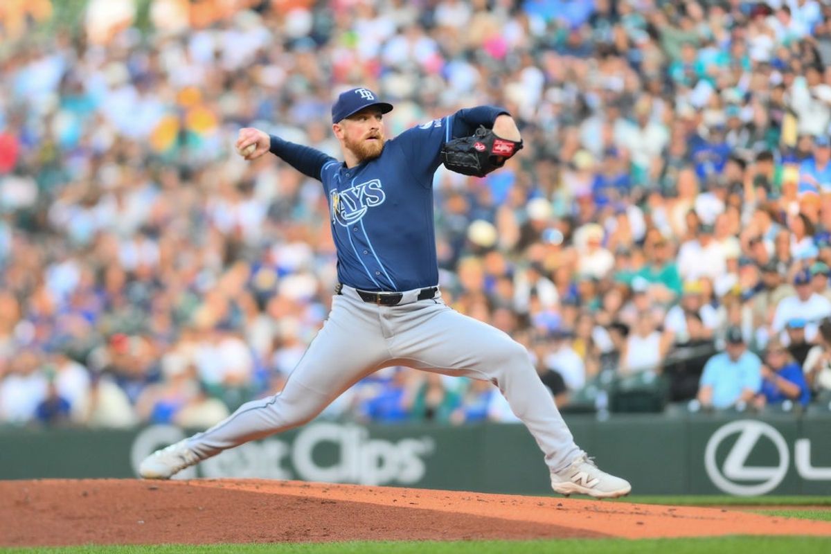 Aug 7, 2026; Seattle, Washington, USA; Tampa Bay Rays starting pitcher Drew Rasmussen (57) pitches to the Seattle Mariners during the first inning at T-Mobile Park. Mandatory Credit: Steven Bisig-Imagn Images