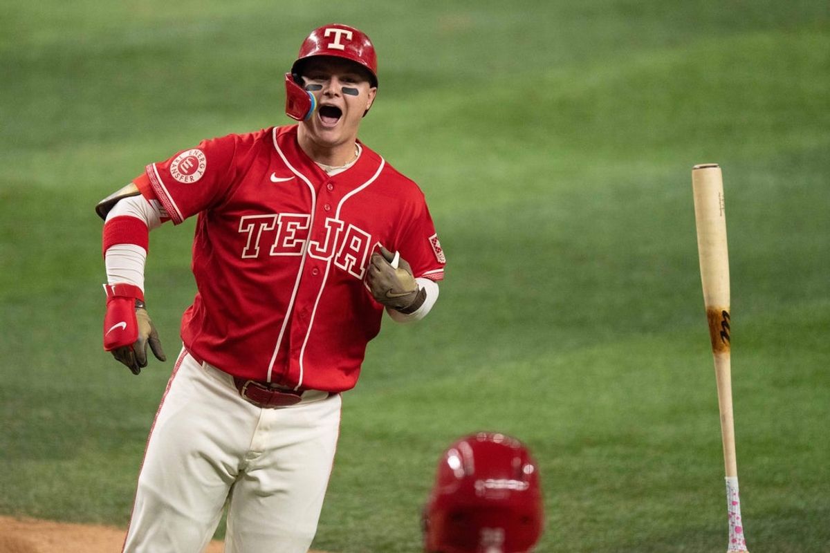 Aug 7, 2026; Arlington, Texas, USA;  Texas Rangers designated hitter Joc Pederson (3) flips the bat as he reacts after hitting a two-run home run against the Baltimore Orioles during the sixth inning at Globe Life Field. Mandatory Credit: Raymond Carlin III-Imagn Images