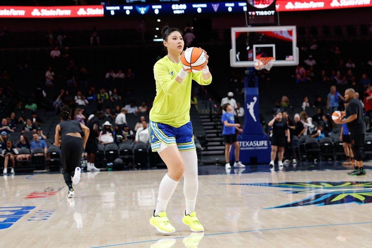 Aug 7, 2026; Dallas, Texas, USA;  Dallas Wings center Li Yueru (28) during warmups before the game against the Golden State Valkyries at American Airlines Center. Mandatory Credit: Chris Jones-Imagn Images