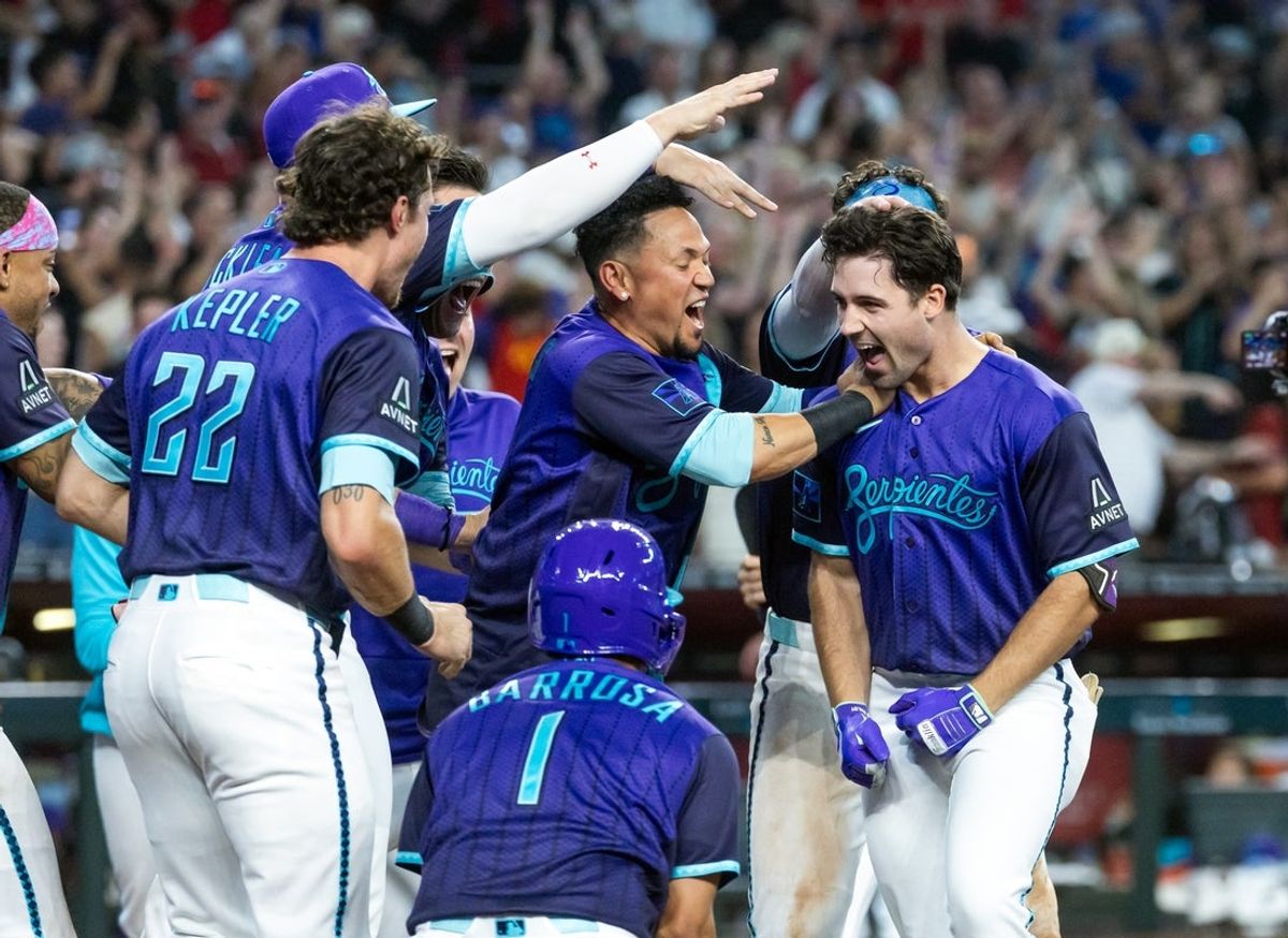 Aug 7, 2026; Phoenix, Arizona, USA; Arizona Diamondbacks outfielder Ryan Waldschmidt (right) celebrates with teammates after hitting a two run walk off home run in the ninth inning against the Los Angeles Dodgers at Chase Field. Mandatory Credit: Mark J. Rebilas-Imagn Images