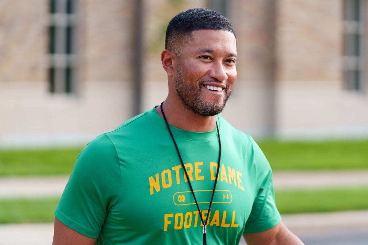 Head coach Marcus Freeman walks to a Notre Dame football practice at Irish Athletic Center on Saturday, Aug. 8, 2026, in South Bend.