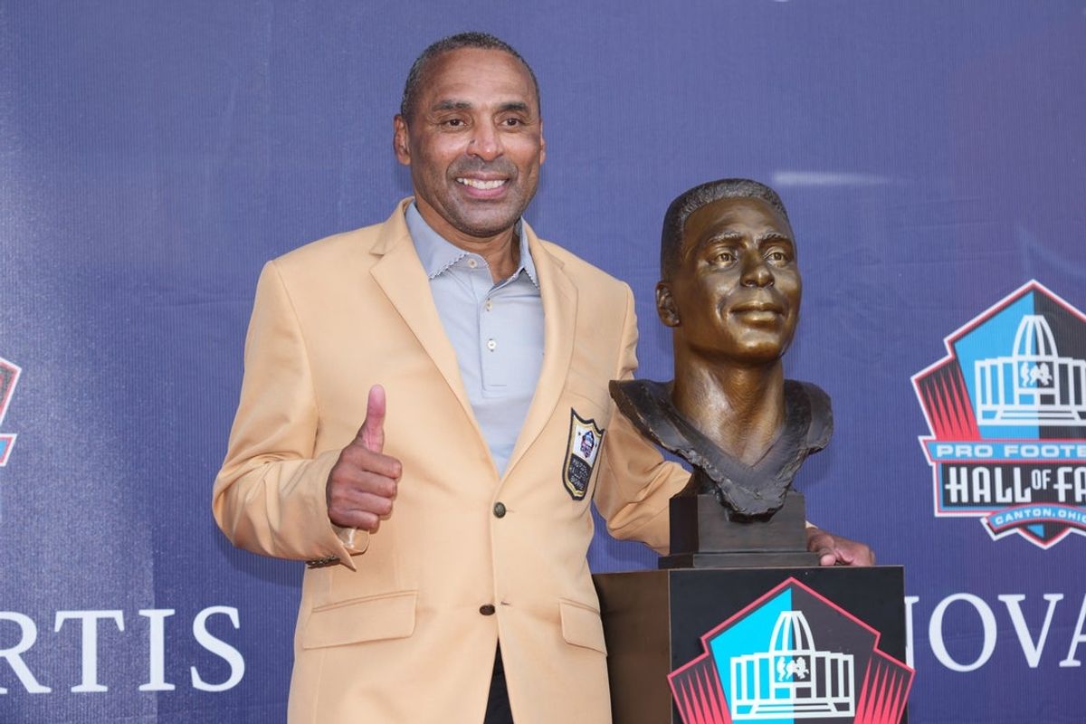 Aug 8, 2026; Canton, OH, USA; Pro Football Hall of Fame enshrinee Roger Craig poses on stage during the Class of 2026 enshrinement ceremony at Tom Benson Hall of Fame Stadium. Mandatory Credit: Kirby Lee-Imagn Images