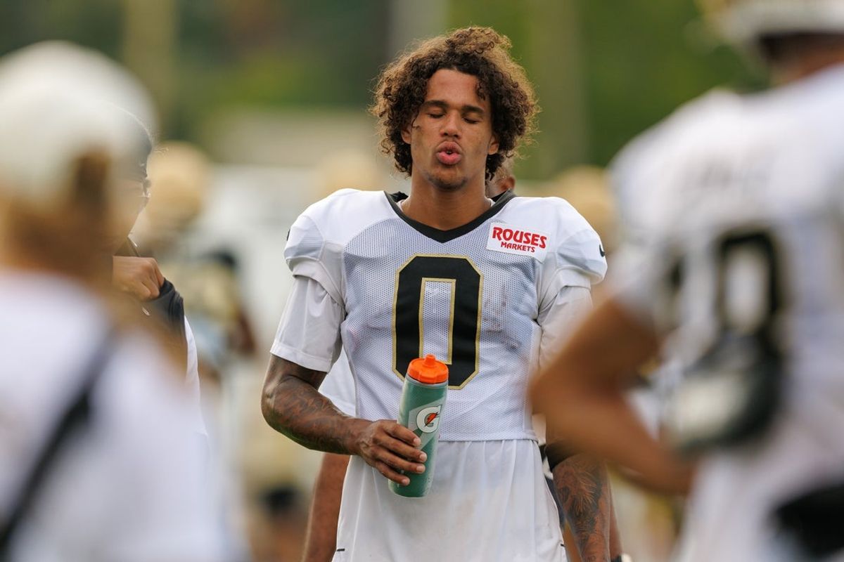 Aug 08, 2026; Metairie, LA, USA; New Orleans Saints wide receiver Jordyn Tyson (0) get a drink on a break during training camp at Ochsner Sports Performance Center. Mandatory Credit: Stephen Lew-Imagn Images