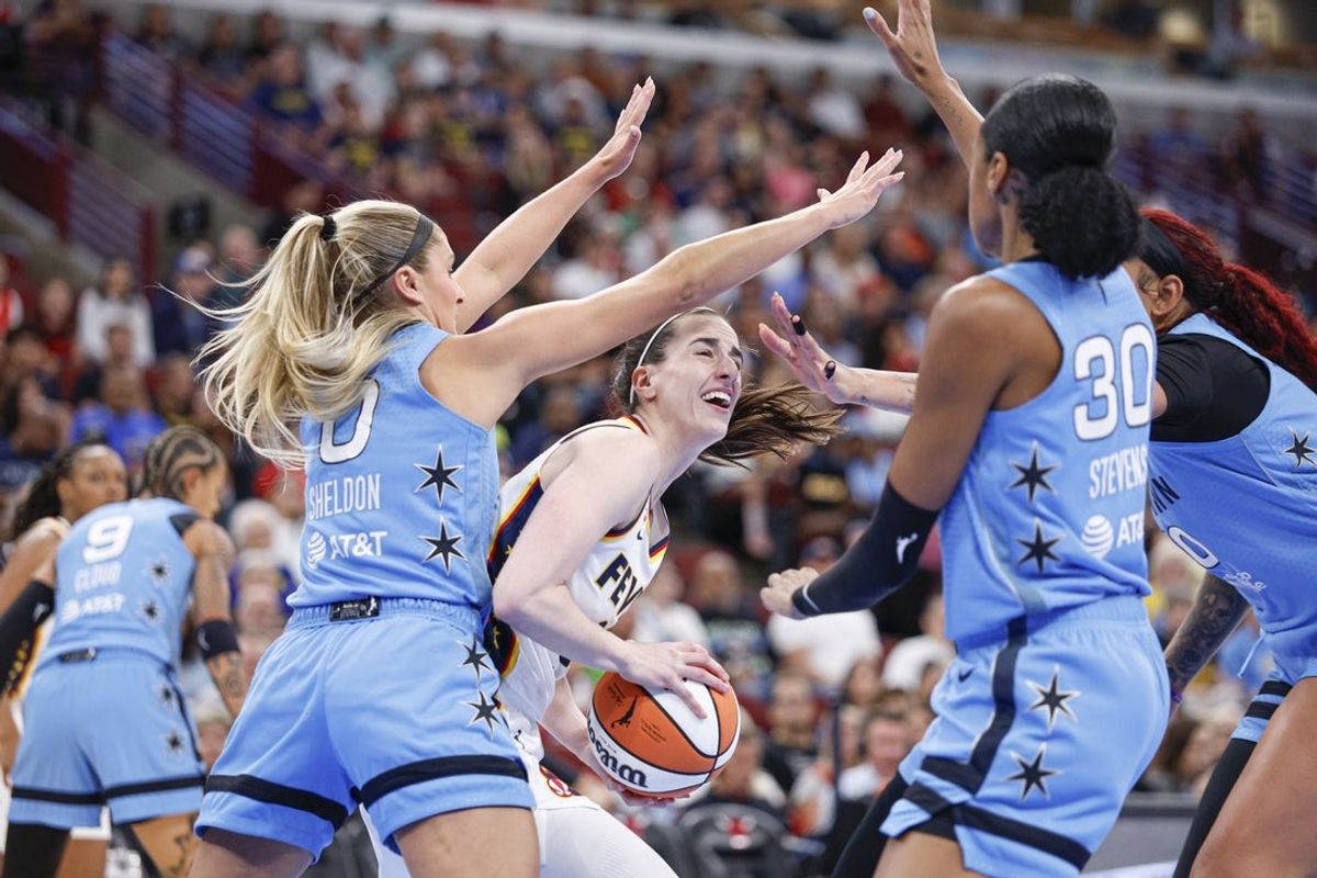 Aug 8, 2026; Chicago, Illinois, USA; Indiana Fever guard Caitlin Clark (22) drives to the basket against the Chicago Sky during the first half at United Center. Mandatory Credit: Kamil Krzaczynski-Imagn Images