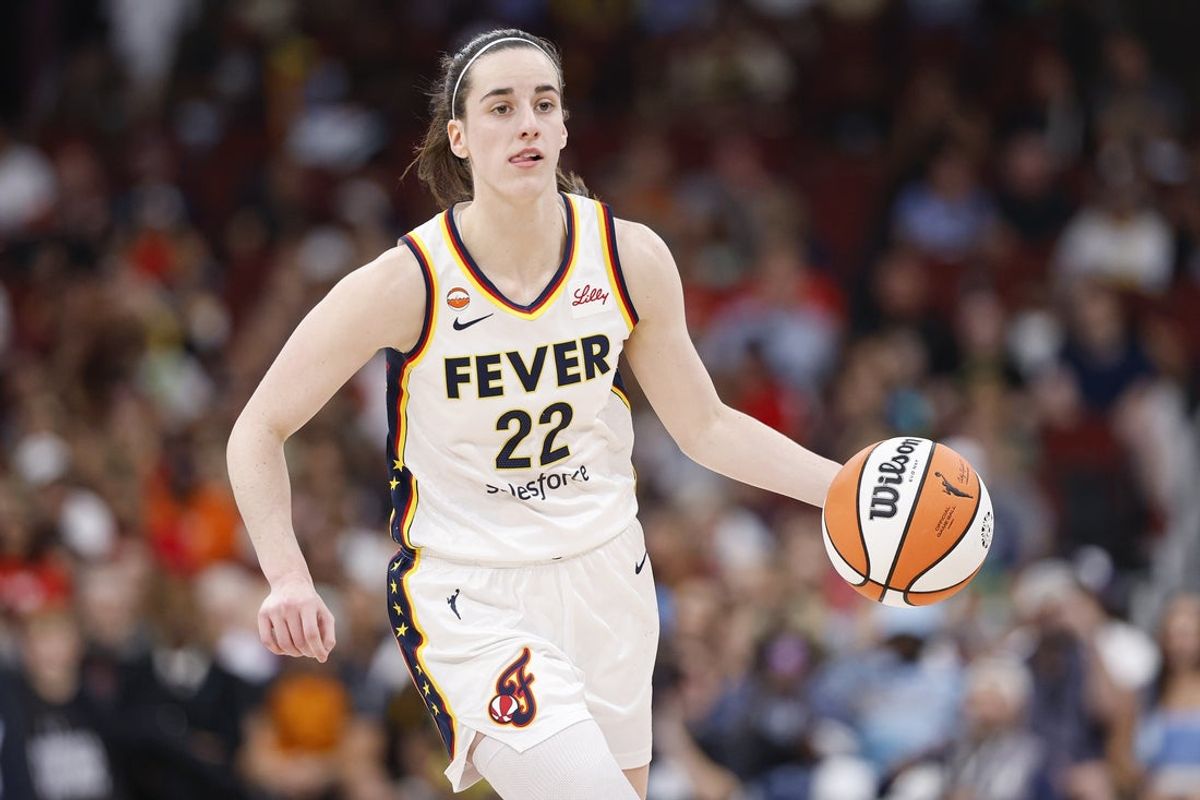 Aug 8, 2026; Chicago, Illinois, USA; Indiana Fever guard Caitlin Clark (22) brings the ball up court against the Chicago Sky during the first half at United Center. Mandatory Credit: Kamil Krzaczynski-Imagn Images