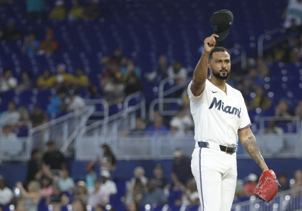 Aug 8, 2026; Miami, Florida, USA; Miami Marlins starting pitcher Sandy Alcantara (22) tips his cap as he acknowledges the crowd after setting the record for Marlins most innings pitched against the Los Angeles Angels during the third inning at loanDepot Park. Mandatory Credit: Rhona Wise-Imagn Images