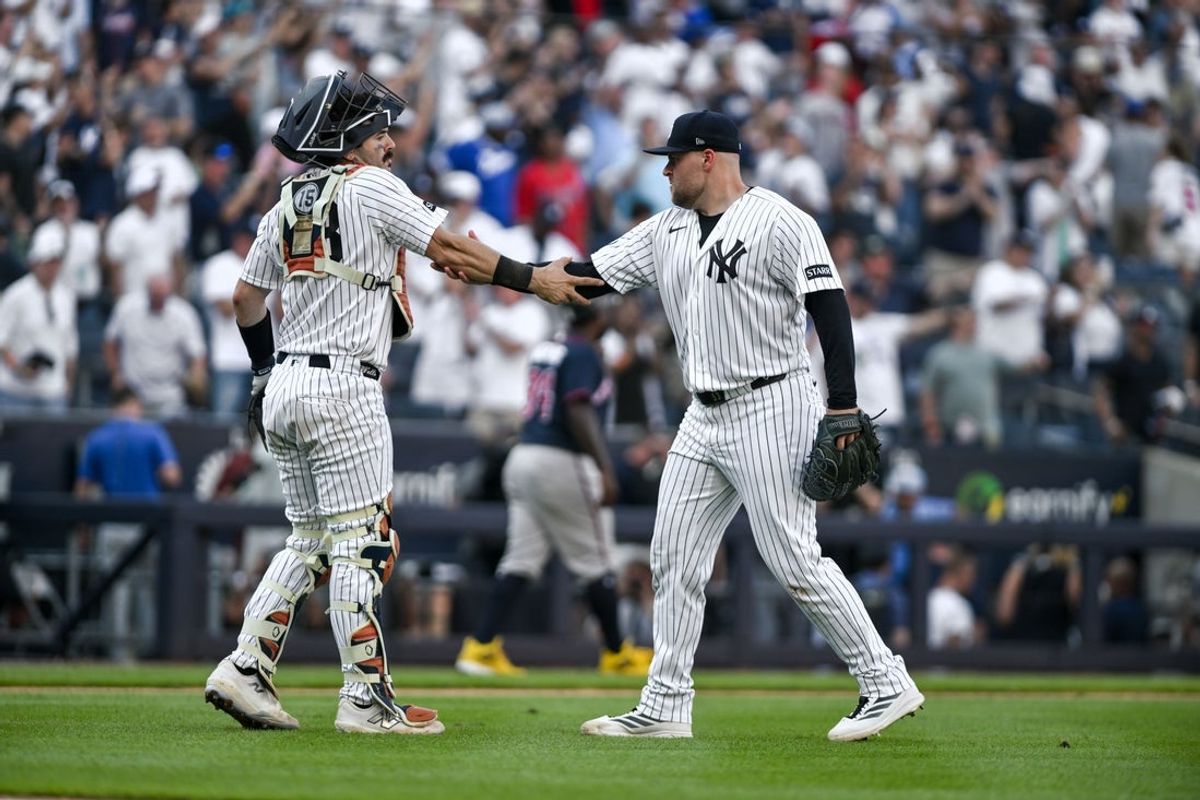 Aug 8, 2026; Bronx, New York, USA; New York Yankees catcher Austin Wells (28) celebrates with pitcher David Bednar (53) after winning against the Atlanta Braves at Yankee Stadium. Mandatory Credit: John Jones-Imagn Images