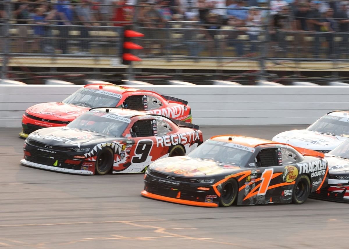 Aug 8, 2026; Newton, Iowa, USA; JR Motorsports driver Justin Allgaier (7), JR Motorsports driver Ross Chastain (9) and JR Motorsports driver Carson Kvapil (1) race for position during the NASCAR O'Reilly Auto Parts Series Race at the Iowa Speedway. Mandatory Credit: Reese Strickland-Imagn Images