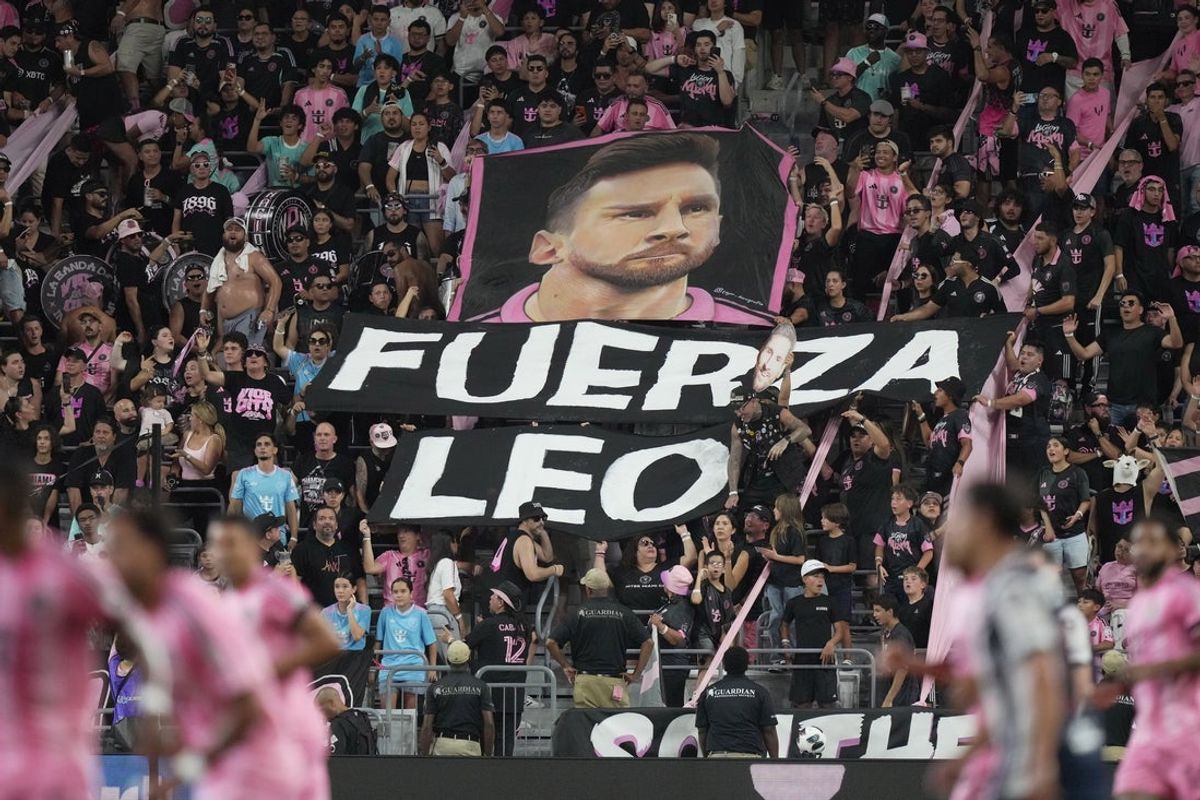 Aug 8, 2026; Miami, FL, USA; Inter Miami fans at the Leagues Cup Phase One match against Monterrey at Nu Stadium send condolences to Lionel Messi following the passing of his father. Mandatory Credit: Jim Rassol-Imagn Images