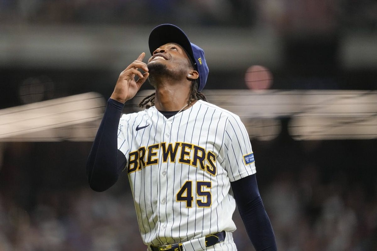 Aug 8, 2026; Milwaukee, Wisconsin, USA;  Milwaukee Brewers pitcher Abner Uribe (45) celebrates following the seventh inning against the Minnesota Twins at American Family Field. Mandatory Credit: Jeff Hanisch-Imagn Images
