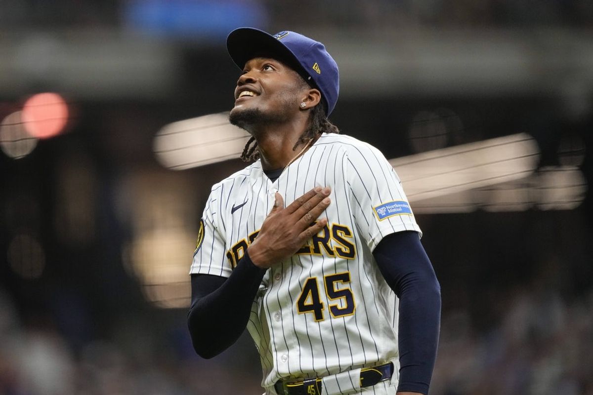 Aug 8, 2026; Milwaukee, Wisconsin, USA;  Milwaukee Brewers pitcher Abner Uribe (45) celebrates following the seventh inning against the Minnesota Twins at American Family Field. Mandatory Credit: Jeff Hanisch-Imagn Images