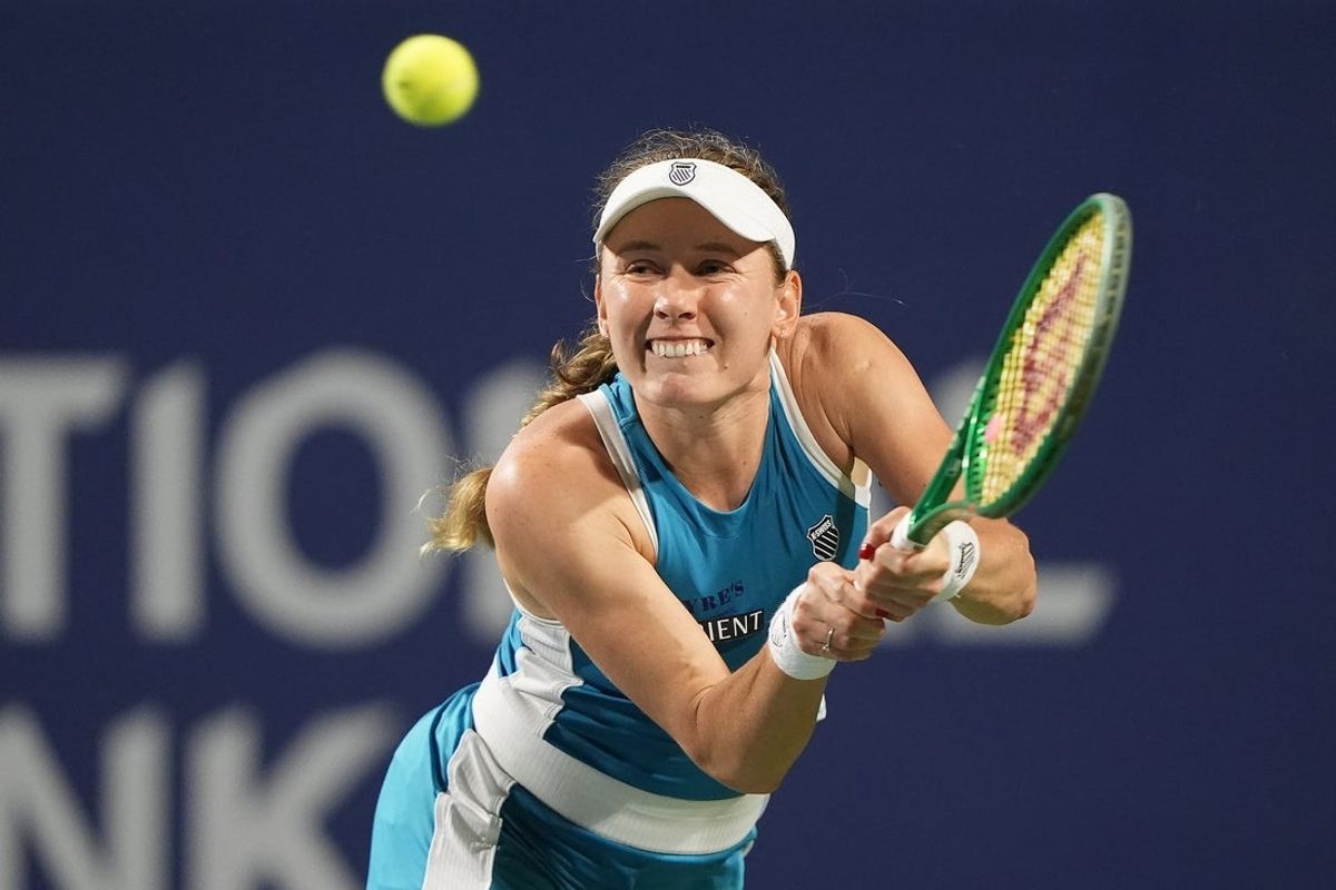 Aug 8, 2026; Toronto, Ontario, Canada; Ekaterina Alexandrova hits a ball to Aryna Sabalenka (not pictured) during the fourth round at the National Bank Open at Sobeys Stadium. Mandatory Credit: John E. Sokolowski-Imagn Images