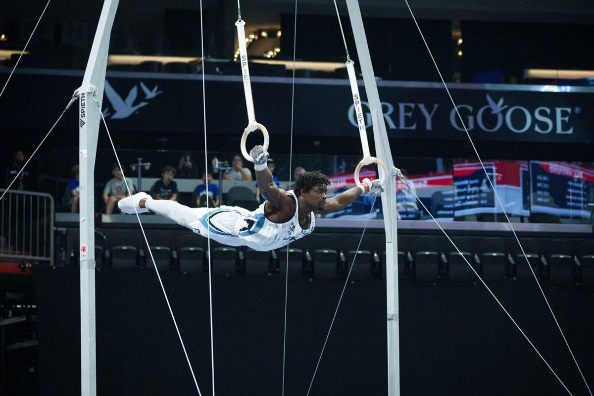 Fred Richard competes on the rings in the Xfinity U.S. Gymnastics senior menÕs championships at the Mortgage Matchup Center on Aug. 8, 2026, in Phoenix.