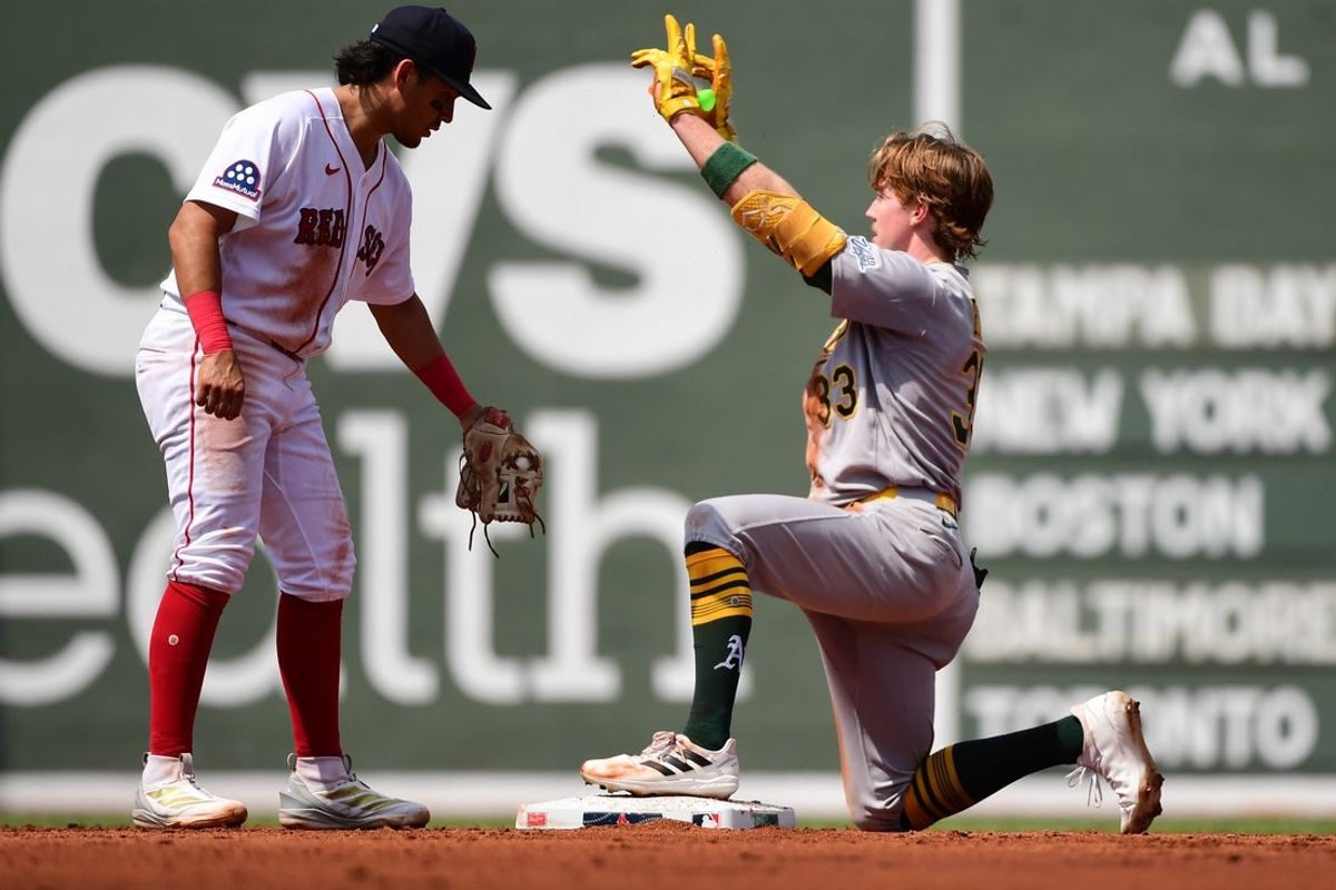 Aug 9, 2026; Boston, Massachusetts, USA;  Athletics center fielder Henry Bolte (33) reacts after hitting a double during the third inning against the Boston Red Sox at Fenway Park. Mandatory Credit: Bob DeChiara-Imagn Images
