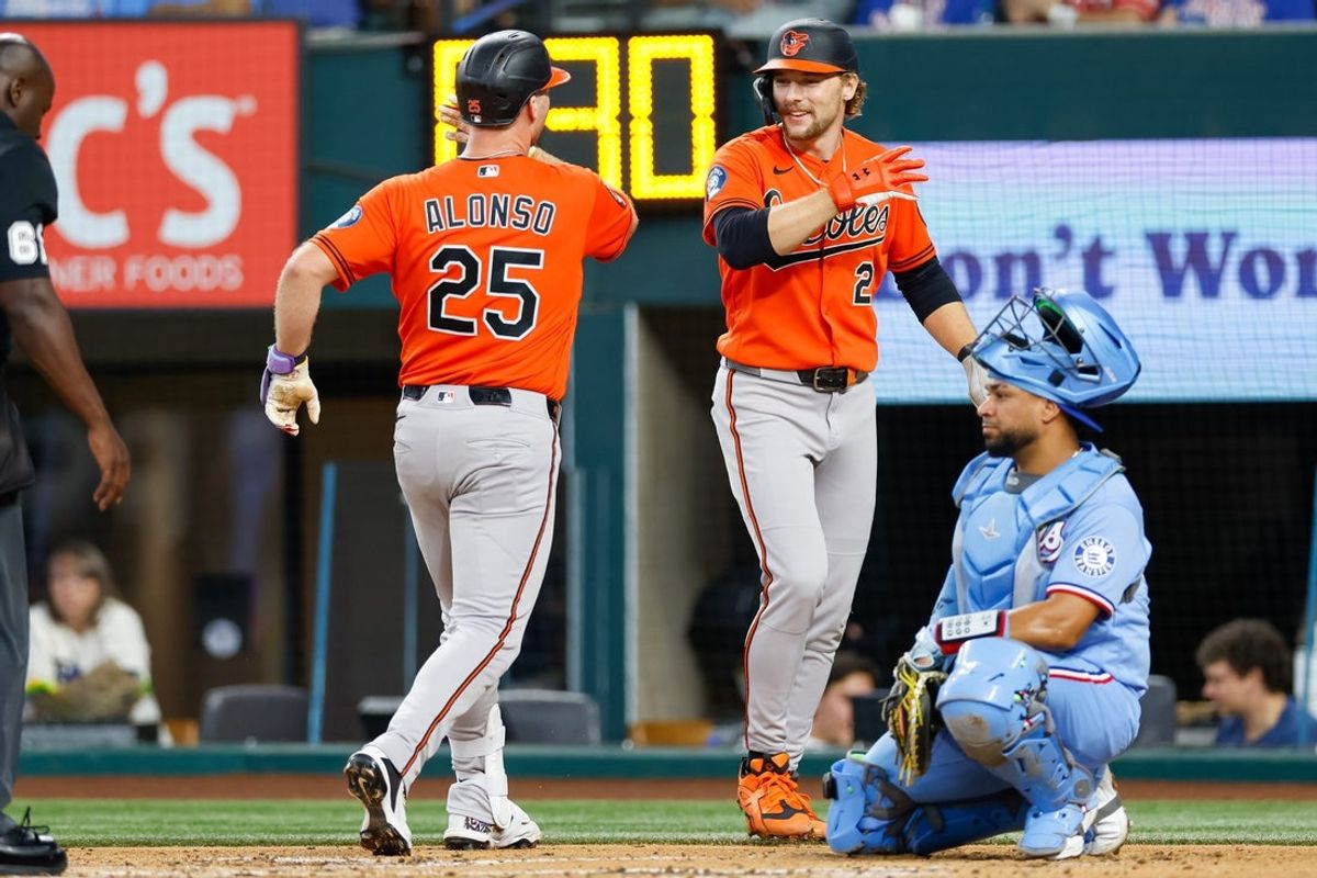 Aug 9, 2026; Arlington, Texas, USA; Baltimore Orioles first baseman Pete Alonso (25) hits a home run during the second inning against the Texas Rangers at Globe Life Field. Mandatory Credit: Andrew Dieb-Imagn Images