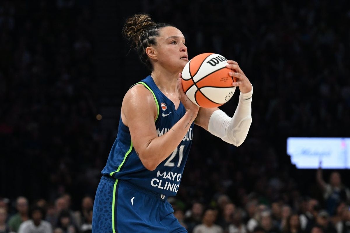 Aug 9, 2026; Minneapolis, Minnesota, USA; Minnesota Lynx guard Kayla McBride (21) shoots a three point basket against the Dallas Wings during the third quarter at Target Center. Mandatory Credit: Jeffrey Becker-Imagn Images