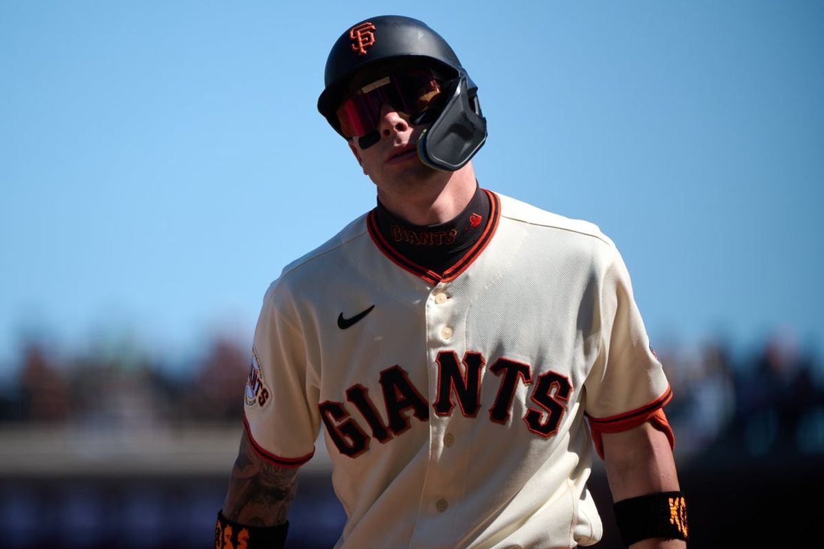 Aug 9, 2026; San Francisco, California, USA; San Francisco Giants infielder Christian Koss (50) reacts after striking out against Detroit Tigers pitcher Tyler Holton (not pictured) during the tenth inning at Oracle Park. Mandatory Credit: Robert Edwards-Imagn Images