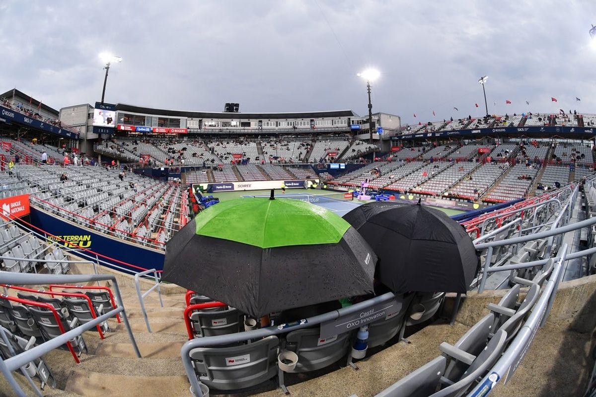 Aug 10, 2026; Montreal, QC, Canada; Rain delay before quarter-final play between Rafael Jodar (ESP) and Arthur Fils (FRA) at IGA Stadium. Mandatory Credit: Eric Bolte-Imagn Images