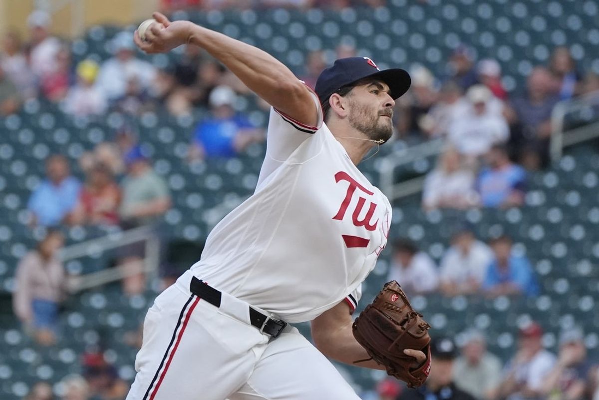 Aug 10, 2026; Minneapolis, Minnesota, USA; Minnesota Twins starting pitcher Dean Kremer (13) throws to the Baltimore Orioles in the first inning at Target Field. Mandatory Credit: Bruce Kluckhohn-Imagn Images