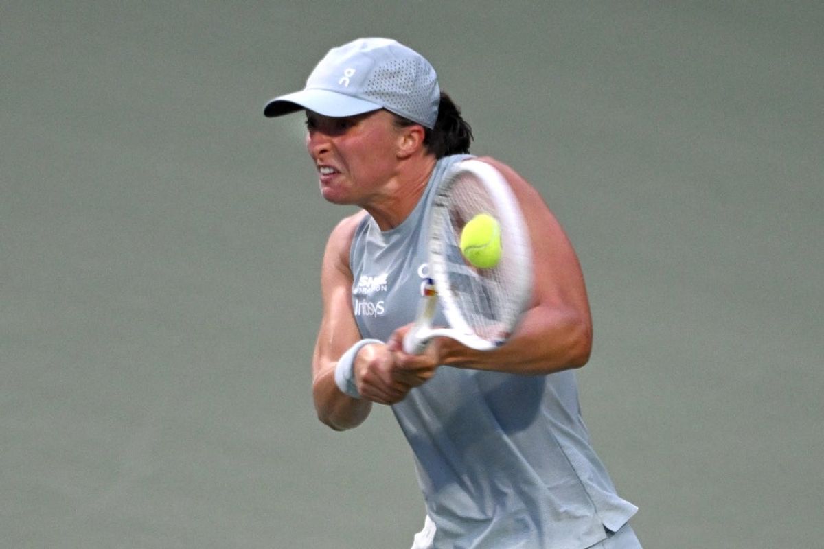 Aug 10, 2026; Toronto, Ontario, Canada; Iga Swiatek (POL) plays a shot against Diana Shnaider during quarter final play at Sobeys Stadium. Mandatory Credit: Dan Hamilton-Imagn Images