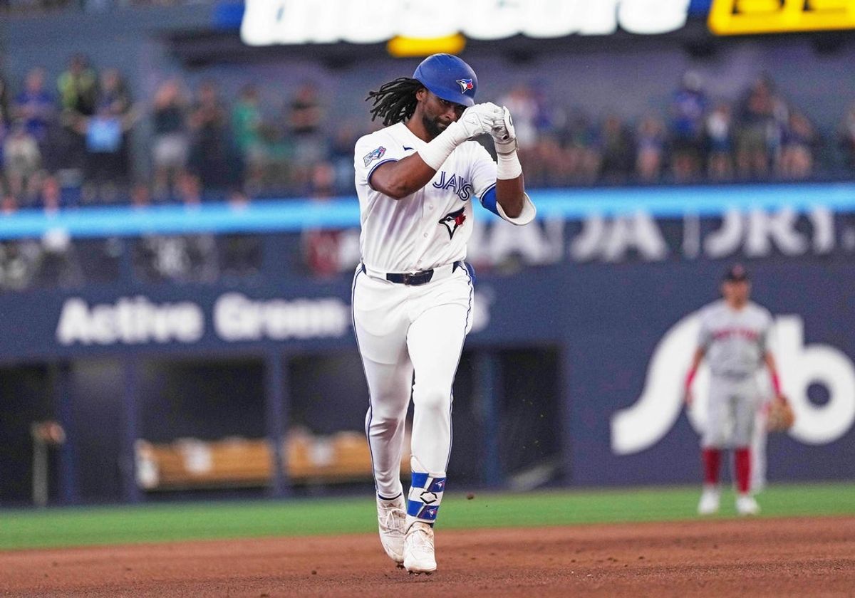 Aug 10, 2026; Toronto, Ontario, CAN; Toronto Blue Jays third baseman Charles McAdoo (26) celebrates hitting a home run during the fifth inning against the Boston Red Sox at Rogers Centre. Mandatory Credit: Nick Turchiaro-Imagn Images