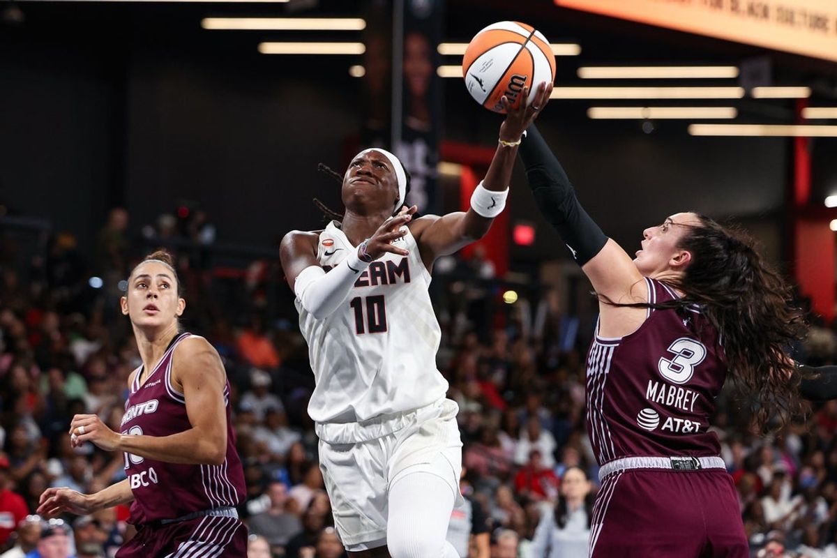 Aug 10, 2026; College Park, Georgia, USA; Atlanta Dream guard Rhyne Howard (10) shoots against Toronto Tempo guard Marina Mabrey (3) in the second quarter at Gateway Center Arena at College Park. Mandatory Credit: Colin Hubbard-Imagn Images