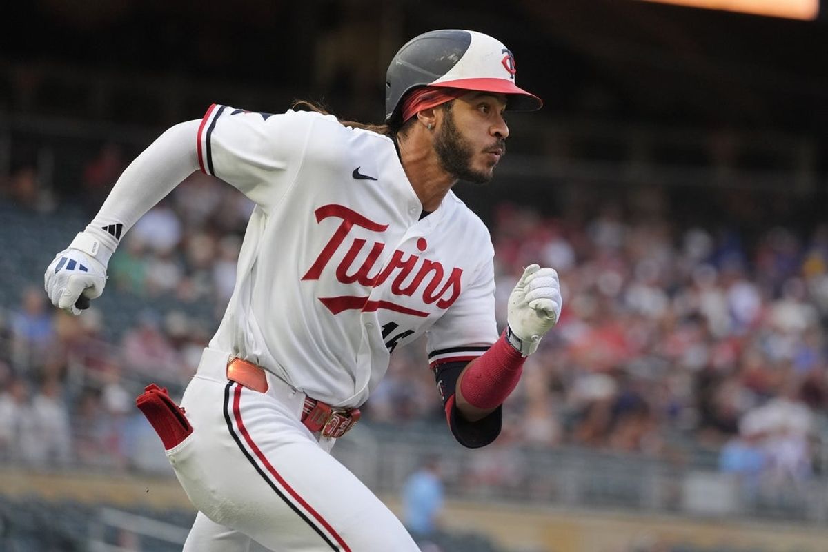Aug 10, 2026; Minneapolis, Minnesota, USA; Minnesota Twins left fielder Austin Martin (16) runs the bases on his double against the Baltimore Orioles in the first inning at Target Field. Mandatory Credit: Bruce Kluckhohn-Imagn Images