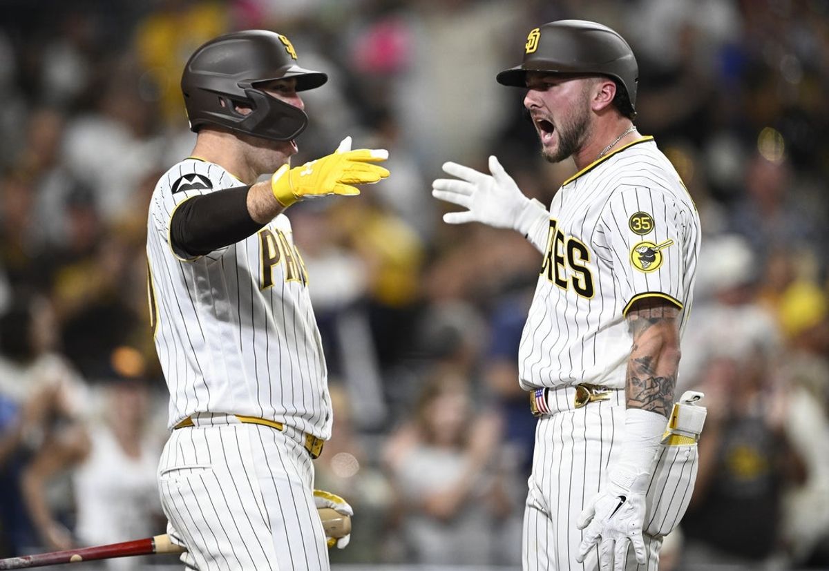Aug 10, 2026; San Diego, California, USA; San Diego Padres center fielder Jackson Merrill (3) is congratulated by San Diego Padres designated hitter Gavin Sheets (30) after hitting a two-run home run during the seventh inning against the Milwaukee Brewers at Petco Park. Mandatory Credit: Denis Poroy-Imagn Images